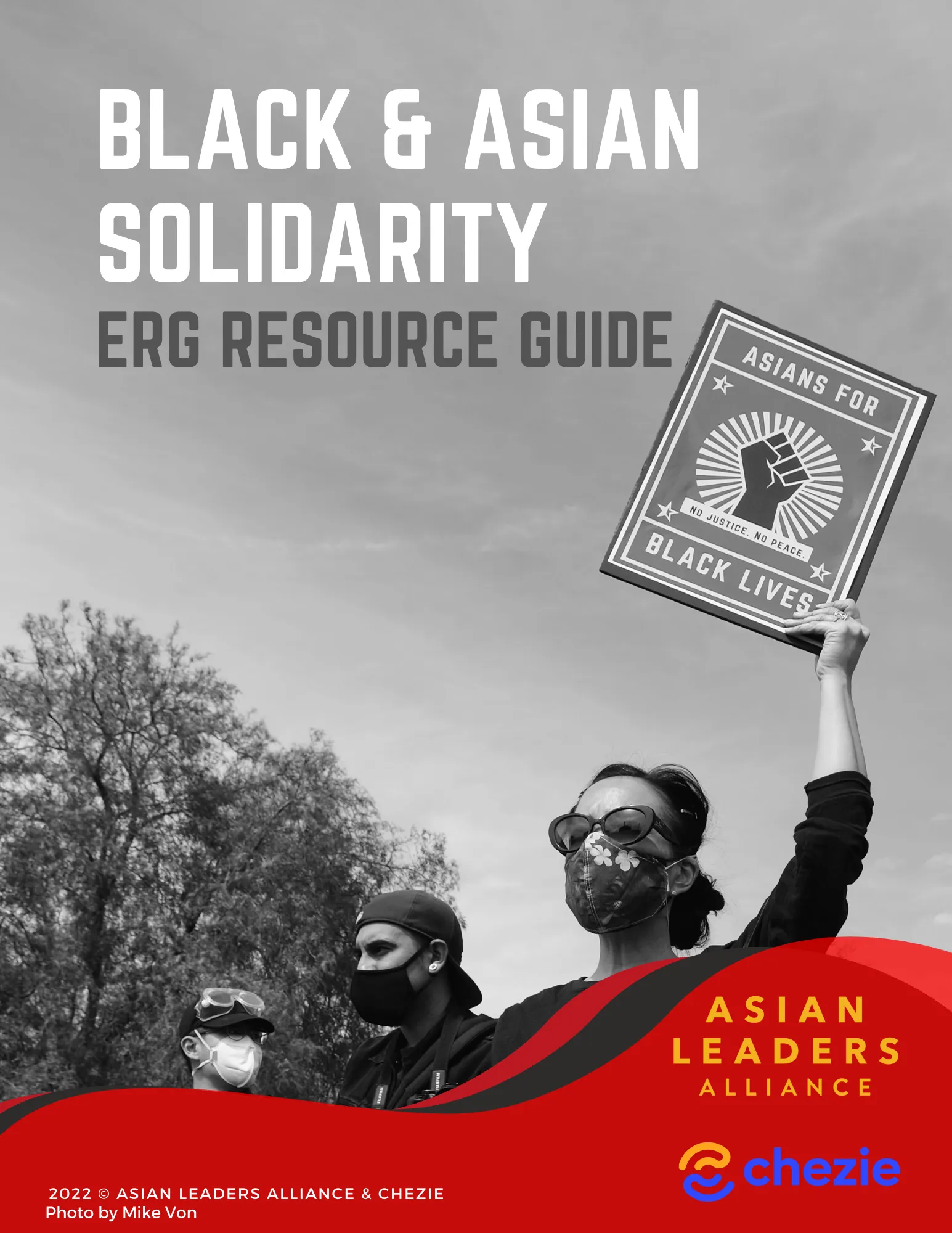 Under the Guides and Kits section there are four images laid out in a 4 by 4 grid. Each image is a link to the specific resources.
Photo Credit: Mike Von
Upper right grid image: Title on black and white background written in white type reads: Black and Asian Solidarity - ERG Resource Guide. Primary image done in black and white photography showing people at a rally with a person holding a sign that reads Asians for Black Lives. trees and sky in the background. Lower right of image Asian Leaders Alliance in gold lettering with Chezie written in royal blue with their logo with the top half of C in gold and the lower half in royal blue. 